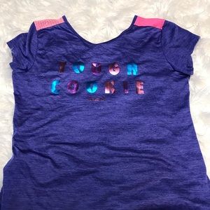 Young girl’s “Tough Cookie” Reebok shirt